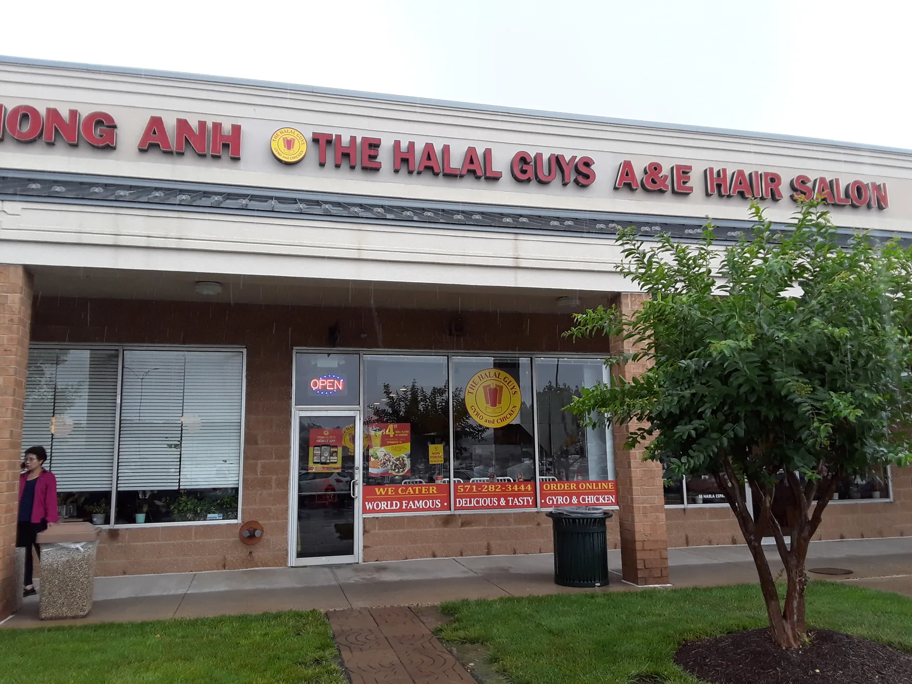The Halal Guys franchise storefront in a suburban Virginia shopping plaza