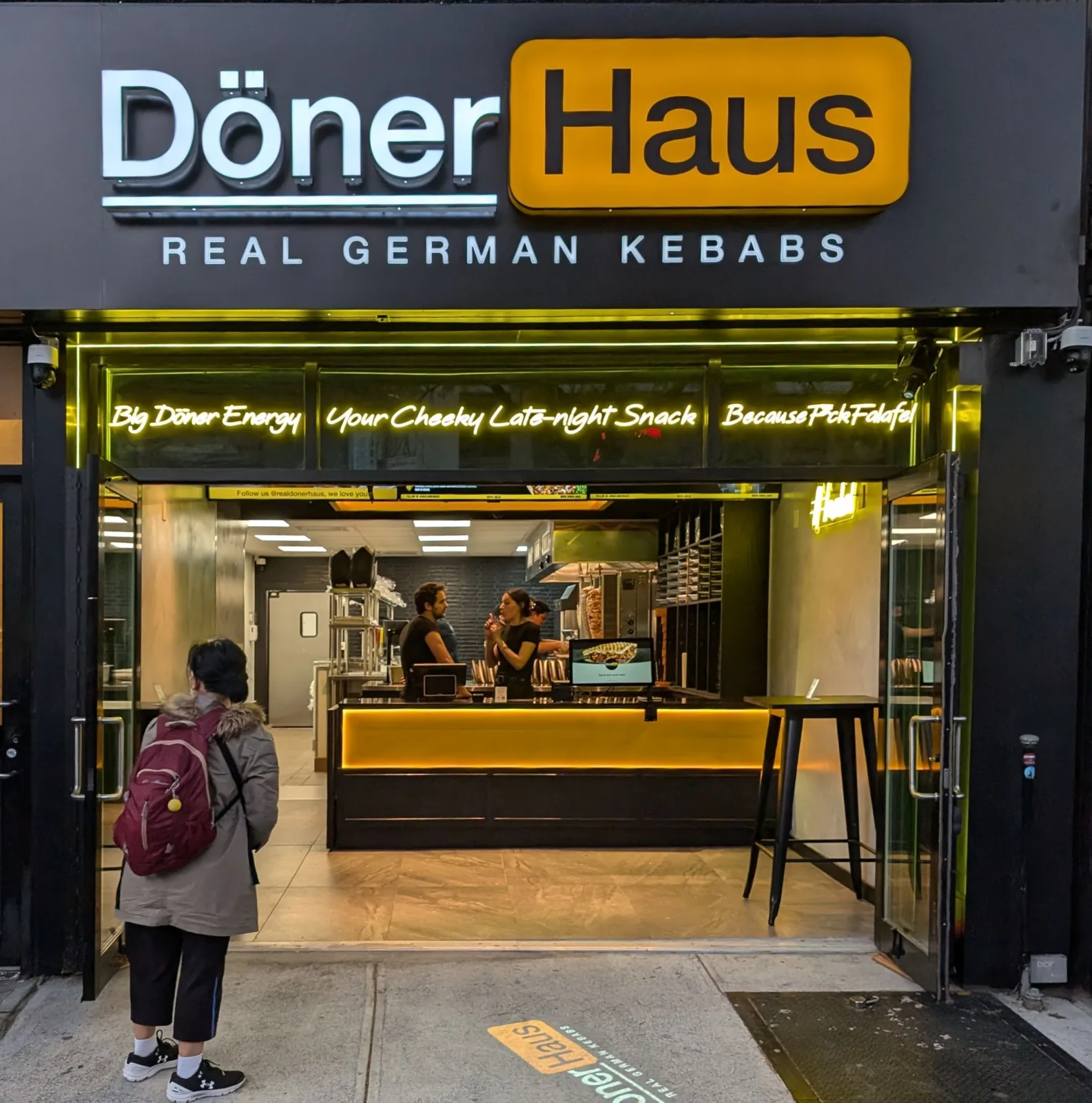 A compact quick-service storefront on a city street